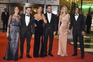 Former Barcelona players Xavi Alonso, Cesc Fabregas and Carles Puyol and their wives pose on a red carpet upon arrival to attend Argentine football star Lionel Messi and Antonella Roccuzzo's wedding in Rosario, Santa Fe province, Argentina on June 30, 2017.
Footballers and celebrities including pop singer Shakira gathered for the "wedding of the century" in Lionel Messi's Argentine hometown as the Barcelona superstar prepared to marry his childhood sweetheart Antonella Roccuzzo. / AFP PHOTO / EITAN ABRAMOVICH