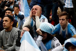 zzzzinte1Fans of Argentina react while watching the FIFA World Cup Russia 2018 match between Argentina and France on a giant screen at San Martin square in Buenos Aires on June 30, 2018.  / AFP PHOTO / Emiliano Lasalviazzzz