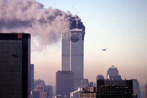 ****inte1A hijacked commercial plane approaches the World Trade Center shortly before crashing into the landmark skyscraper 11 September 2001 in New York.   AFP PHOTO/Seth McCallister****