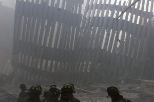 Firemen work around the remains of the World Trade Center after both towers collapsed after planes crashed into the buildings in New York on September 11, 2001. The kamikaze airplane attacks that destroyed New York's World Trade Center and damaged the Pentagon on Tuesday were unprecedented in the history of civil aviation, security experts said. 
REUTERS/Peter Morgan