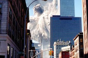 ****inte1The south tower of the World Trade Center collapses sending dust and smoke into the streets 11 September, 2001, in New York. Two planes crashed into each building. Both towers would later collapse.  AFP PHOTO/Aaron MILESTONE****