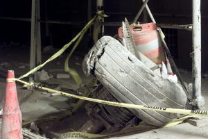 A tire from a jet laying in the street near the destroyed World Trade Center in New York on September 11, 2001.Two hijacked U.S. commercial planes slammed into the twin towers of the World Trade Center on Tuesday, causing both 110-story landmarks to collapse in thunderous clouds of fire and smoke.      REUTERS/Shannon Stapleton