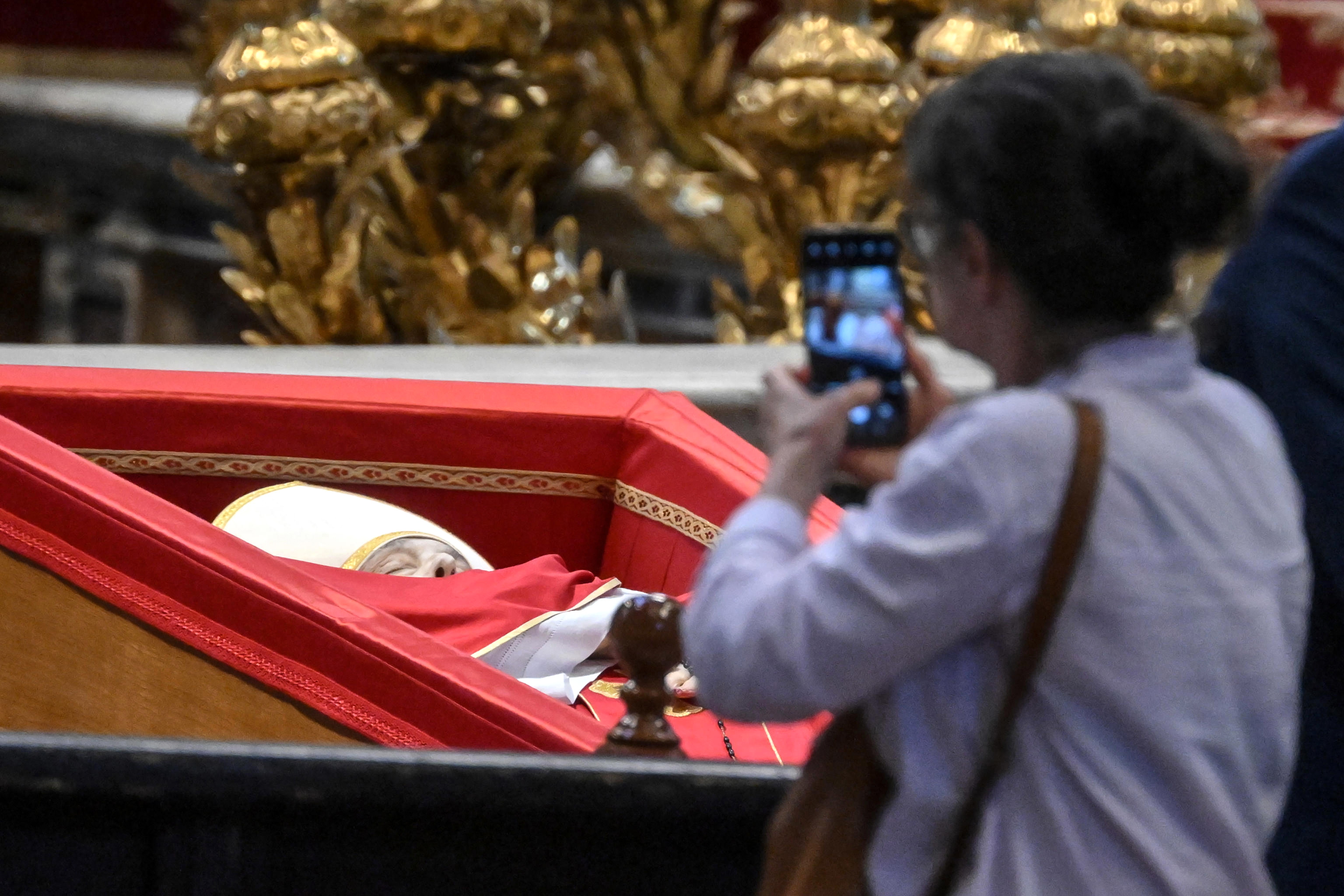 Pope Francis' body lies in state inside St. Peter's Basilica ahead of funeral